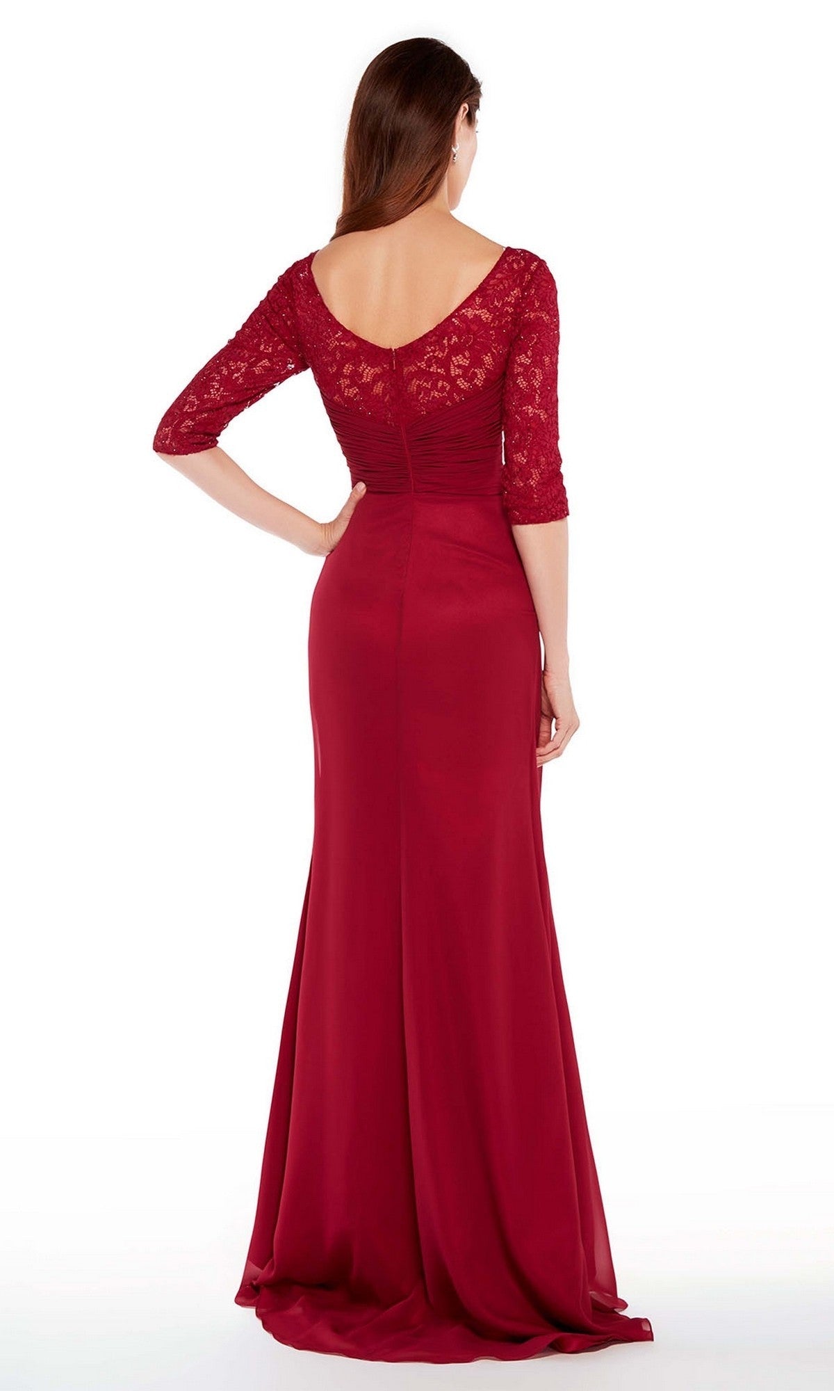 Woman in the Alyce 27234 long formal dress, a floor-length deep red mother-of-the-bride gown with beaded lace three-quarter sleeves, stands with her back to the camera against a white background.